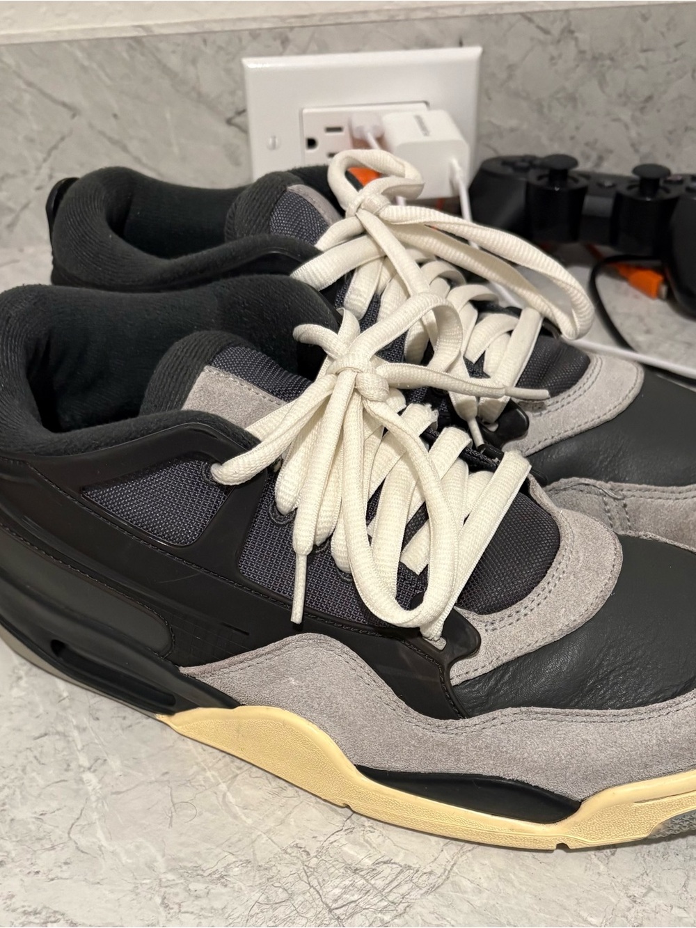 Nike Men's Jordans Black and Gray Sneakers with Cream Sole and White Laces